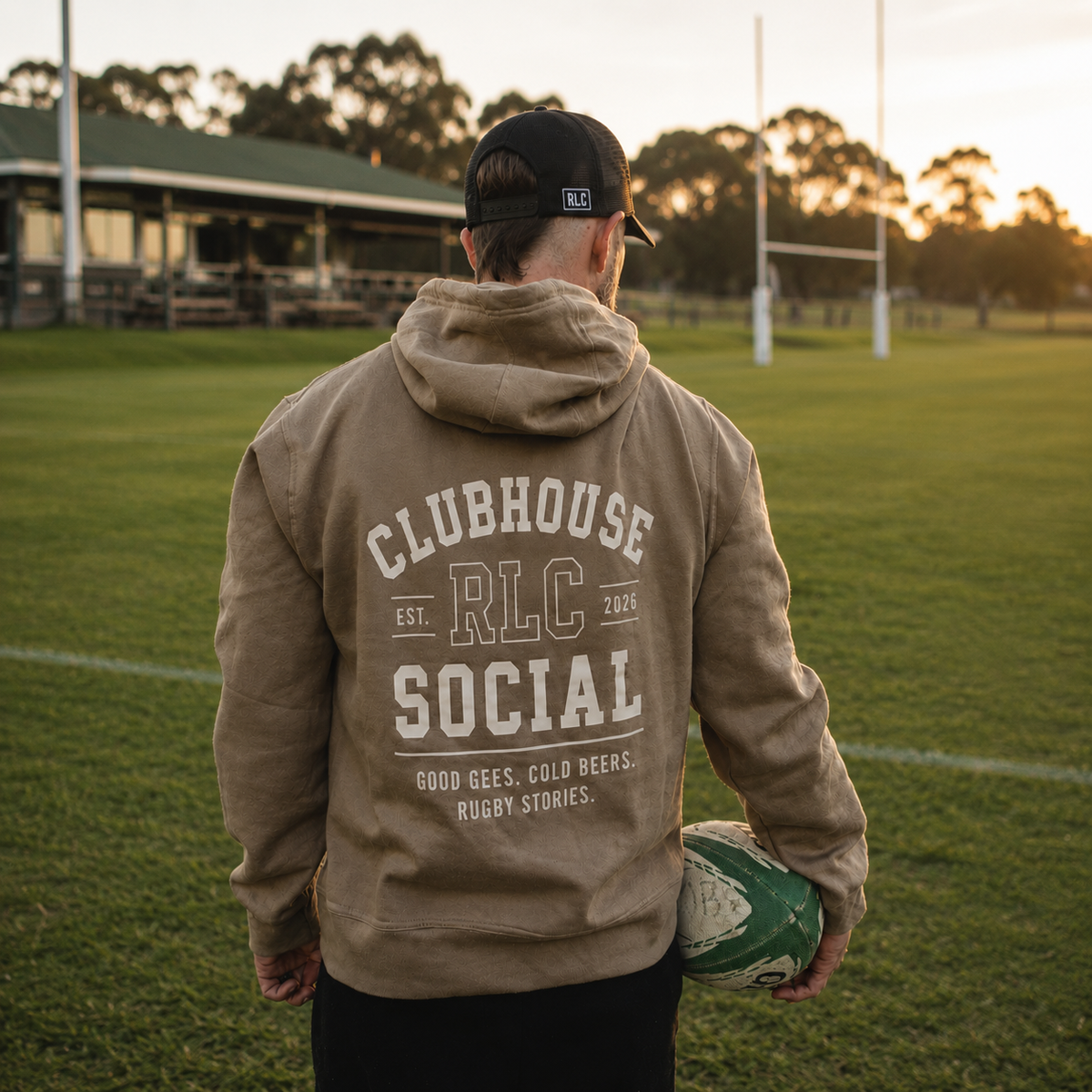 Clubhouse Social Hoodie worn around the fire after a rugby match